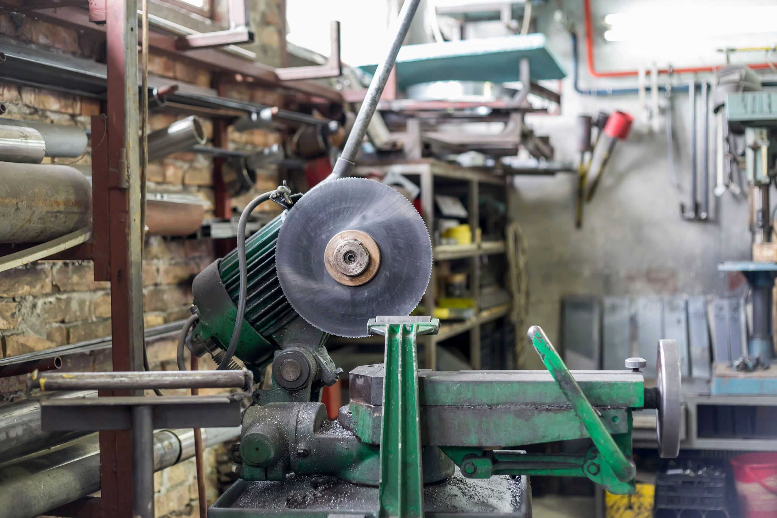 Metal fabrication saw inside a workshop